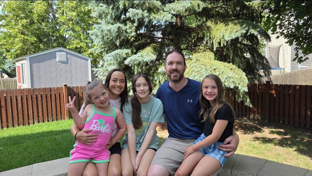 Sean Rash with his three daughters